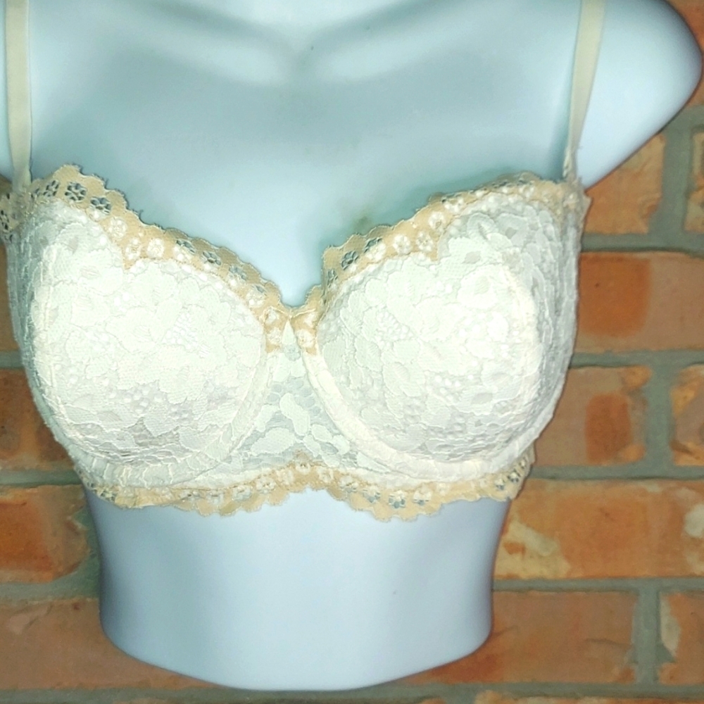 VS bra converts to strapless with silicone stays @ top & bottom.
